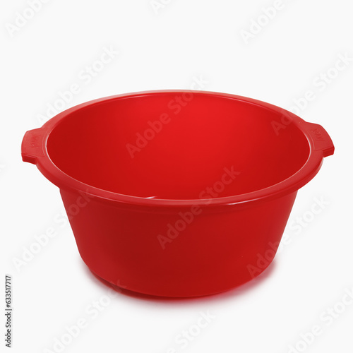 Red empty plastic basin on white isolated background