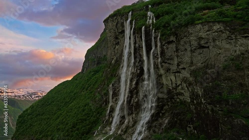Seven Sisters Waterfall on the Geiranger fjord during a majestic and beautiful sunset, Norway
