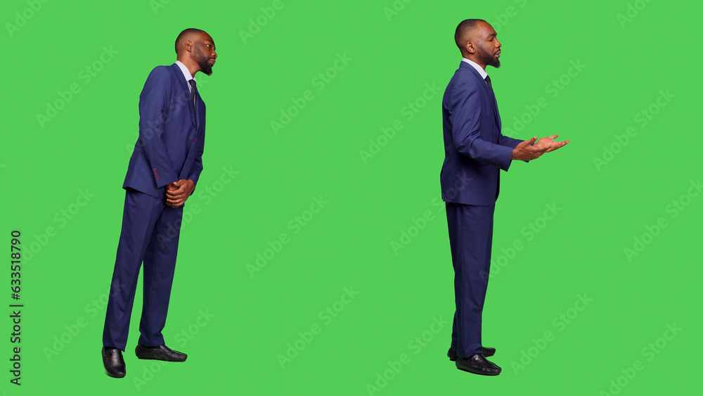 Male office worker in formal suit waiting in studio, looking around over full body green screen. Startup employee feeling confident and stylish on camera, greenscreen background. Male office worker in formal suit waiting in studio, looking around over full body green screen. Startup employee feeling confident and stylish on camera, greenscreen background.
