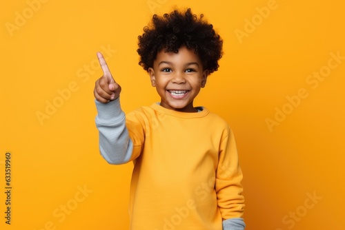 Girl points her finger, banner with copyspace for advertising and promotions