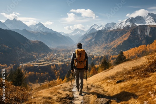 Backpacker hiking along a breathtaking ridge - stock photography