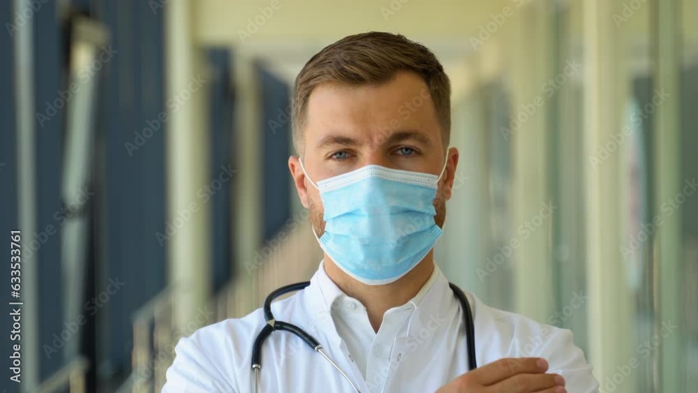 Close Up Portrait of Family Medical Doctor in Health Clinic. Successful Physician in White Lab Coat Looks at the Camera in Hospital Office Close Up Portrait of Family Medical Doctor in Health Clinic. Successful Physician in White Lab Coat Looks at the Camera in Hospital Office