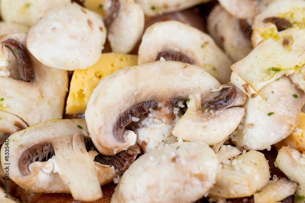 sliced mushrooms while cooking dishes with champignons sliced mushrooms while cooking dishes with champignons