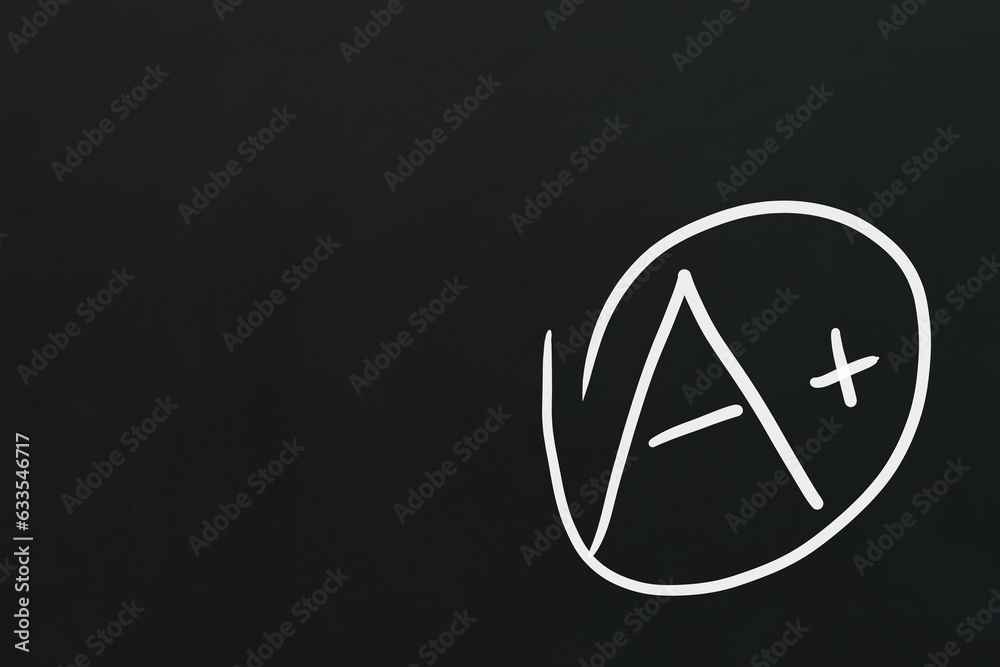 School grade. Chalked letter A with plus symbol on blackboard