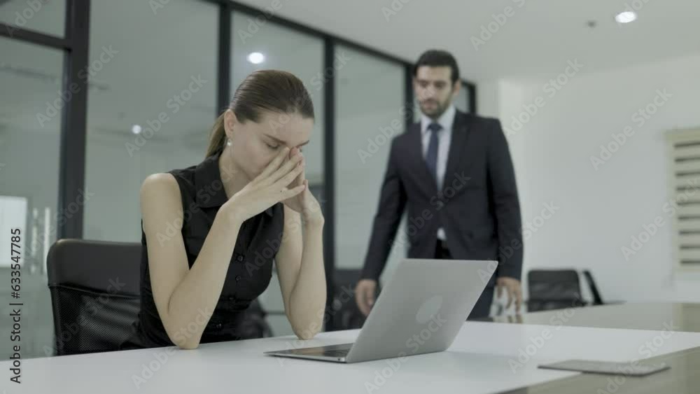 business people female colleague with stress headache from overwork business people female colleague with stress headache from overwork