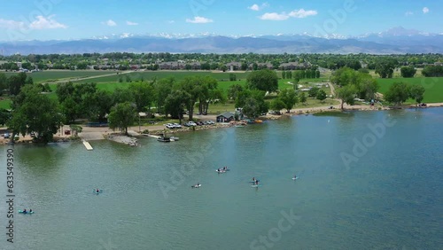 Paddleboarders enjoy the water at Union Reservoir in Colorado photo