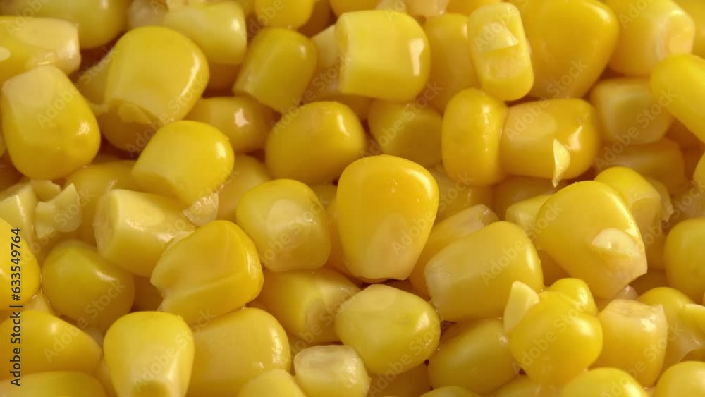 Sweet corn kernels macro rotate like a background. Ingredient for mexican salad filled with vitamins Sweet corn kernels macro rotate like a background. Ingredient for mexican salad filled with vitamins