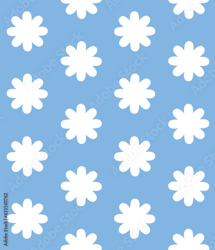 Vector seamless pattern of flat hand drawn flower silhouette isolated on blue background