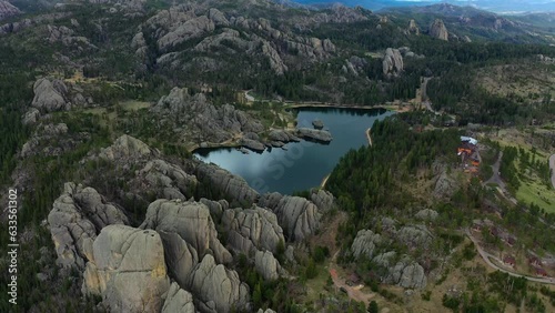 A lake reflects the blue sky in its secluded spot in the Black Hills of SD