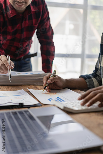 Young businessmen have business investment ideas in the conference room, they are having brainstorming meetings and planning to manage the growth and profitability of the company. Vertical Image