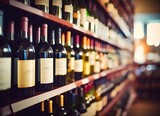 Abstract blur wine bottles on liquor alcohol shelves in supermarket store background. 