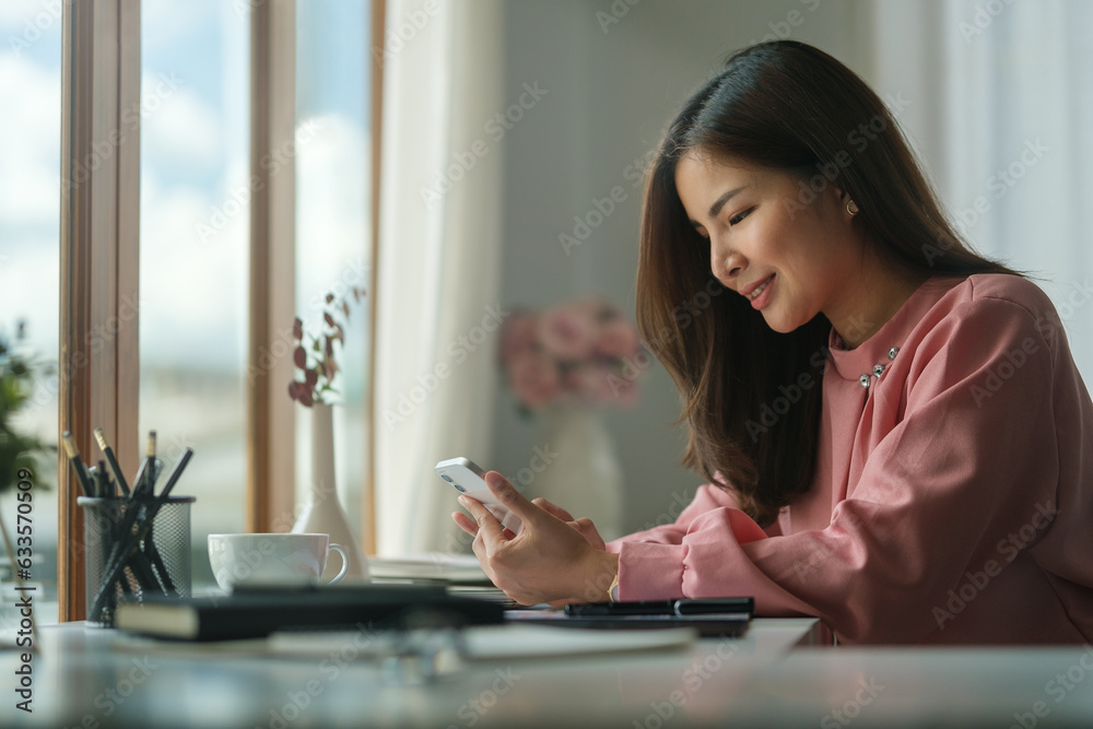 Beautiful businesswoman checking message on smartphone. Communication, connection, technology, business lifestyle concept. Beautiful businesswoman checking message on smartphone. Communication, connection, technology, business lifestyle concept.