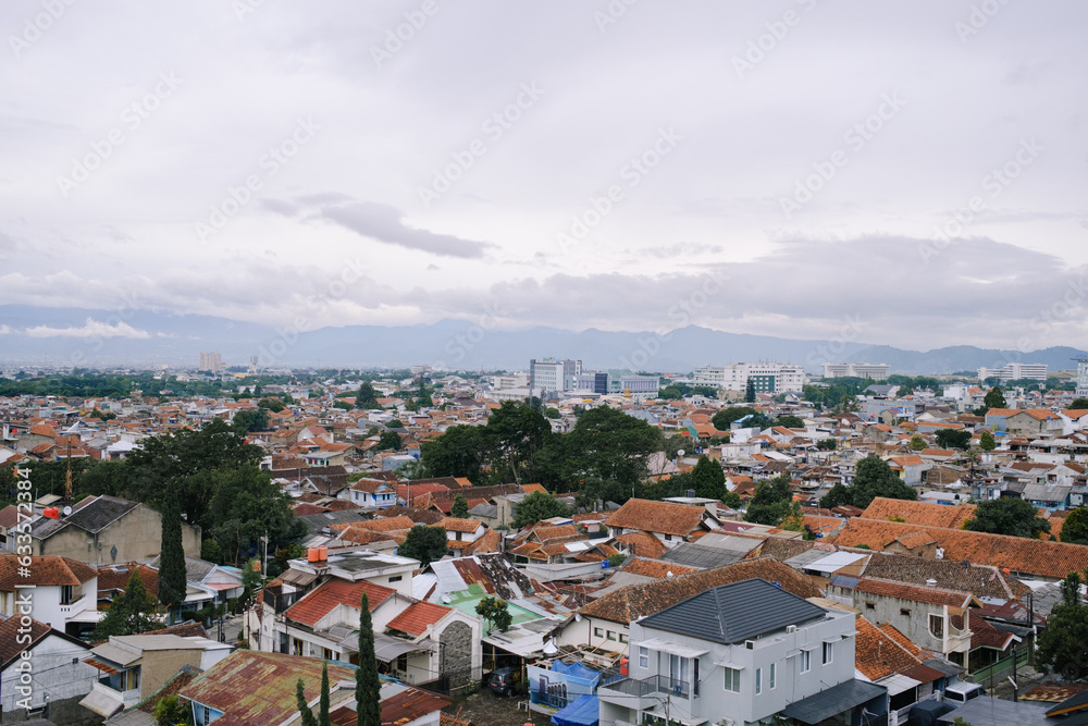 view of Bandung city with a mountain behind