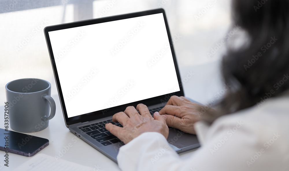 Close up view businesswoman hands typing on keyboard of laptop computer. Close up view businesswoman hands typing on keyboard of laptop computer.
