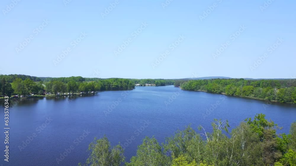 Majestic aerial top view flight
Natural Summer Paradise idyllic Island in Lake, Chlum in Czech, day 2023. overflight flyover drone
4K Cinematic Majestic aerial top view flight
Natural Summer Paradise idyllic Island in Lake, Chlum in Czech, day 2023. overflight flyover drone
4K Cinematic
