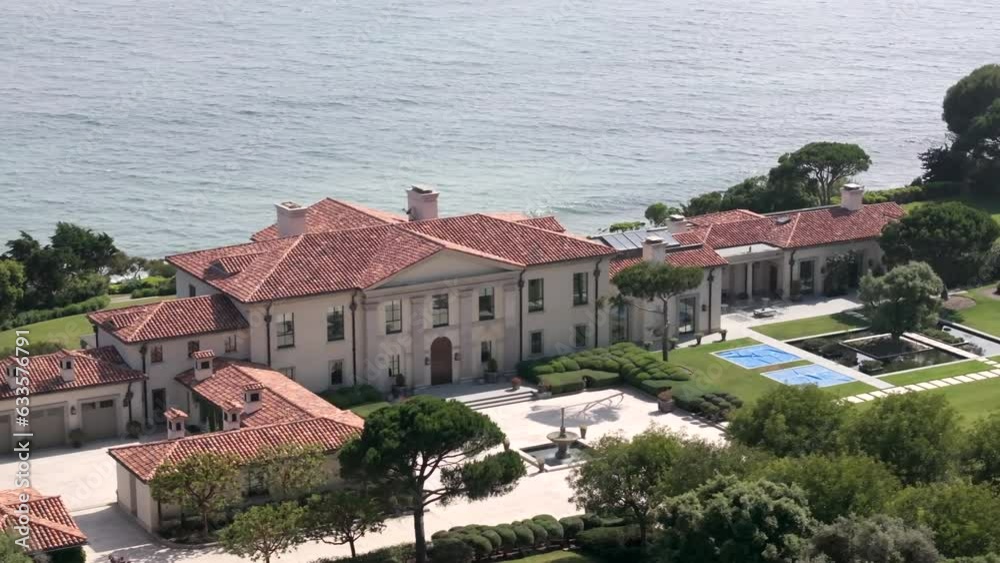 Aerial View Of Pacific Ocean Front Mansion In Malibu. Dolly Right Aerial View Of Pacific Ocean Front Mansion In Malibu. Dolly Right