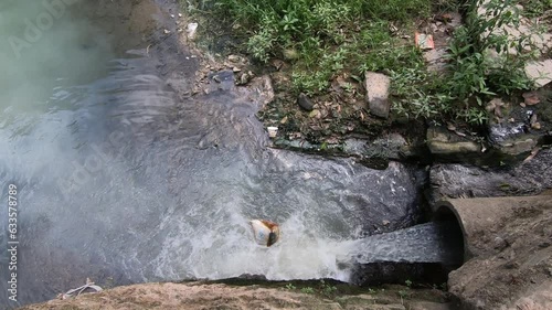 A waste water outfall in Yangshuo County, Guilin, Guangxi, China photo