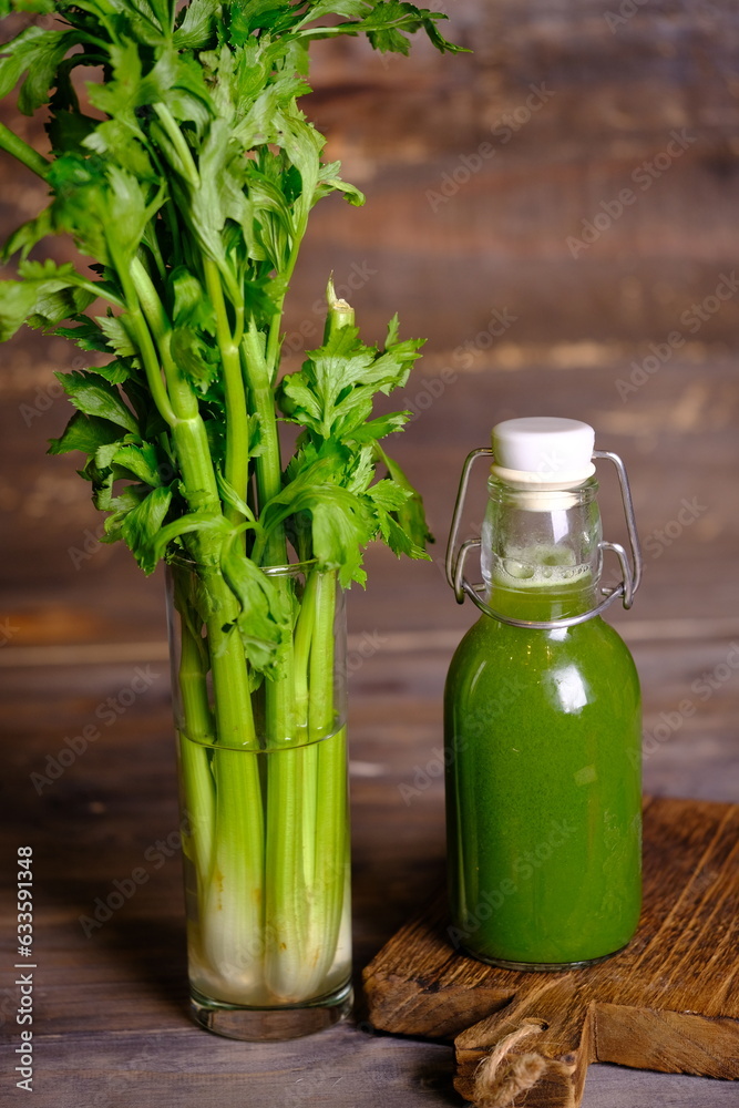 celery juice in clear glasses and bottles. Celery is a leaf vegetable and medicinal plant commonly used as a cooking spice. This juice has health benefits, diet drinks and health drinks. Celery. celery juice in clear glasses and bottles. Celery is a leaf vegetable and medicinal plant commonly used as a cooking spice. This juice has health benefits, diet drinks and health drinks. Celery.