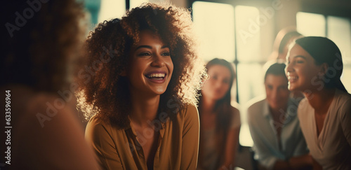 illustration of young black woman smiling she is in a group meeting or class  photo