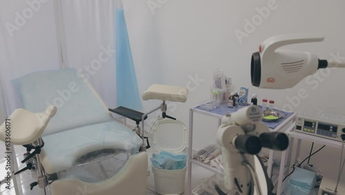 obstetric, gynecological chair for examination of women photo