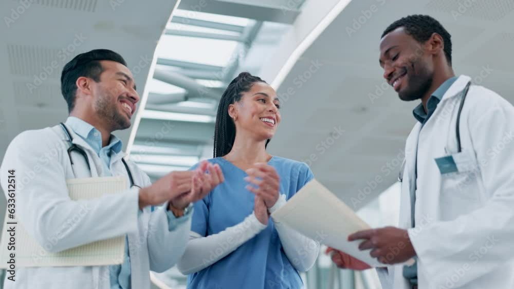 Doctors, high five and teamwork for healthcare success, applause and hospital motivation, clinic results or team support. Nurses, medical professional and group of people, hands together and clapping Doctors, high five and teamwork for healthcare success, applause and hospital motivation, clinic results or team support. Nurses, medical professional and group of people, hands together and clapping