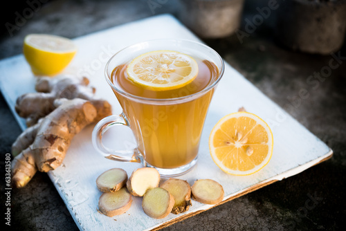 Ginger tea with lemon in a glass