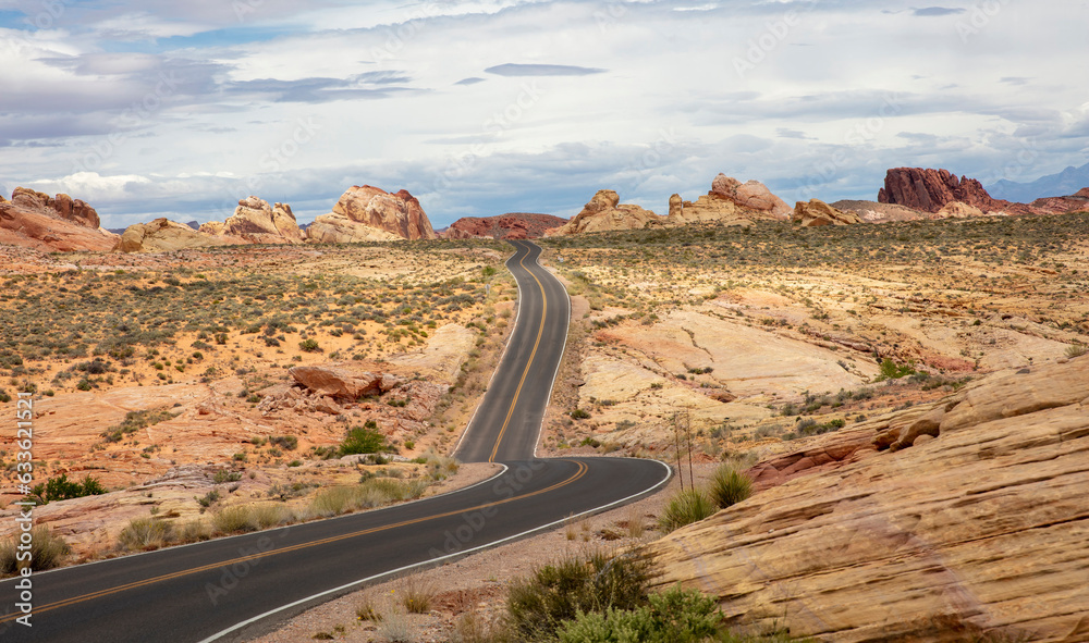 Fototapeta premium Valley of Fire State Park Nevada, USA. Empty curvy highway, desert, red rocky formation.