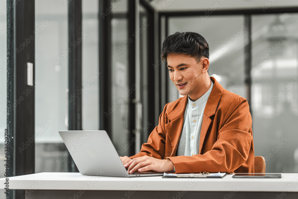 Asian business asian man supervisor analyse financial report of responsible worker pay attention on mistakes propose correction.