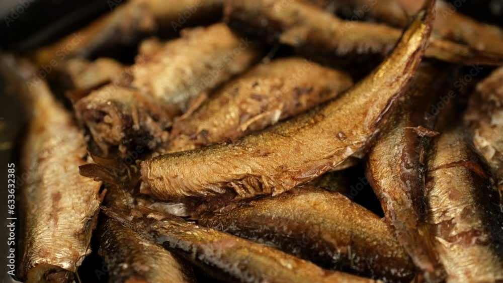Smoked fish sprats in oil, rotate Smoked fish sprats in oil, rotate