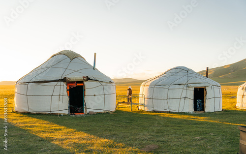 Sunset at the yurt camp.Discover the nomadic life of the nomads camping and in yurt camps. Yurt is a circular tent of felt or skins on a collapsible framework. © Pavel Kašák