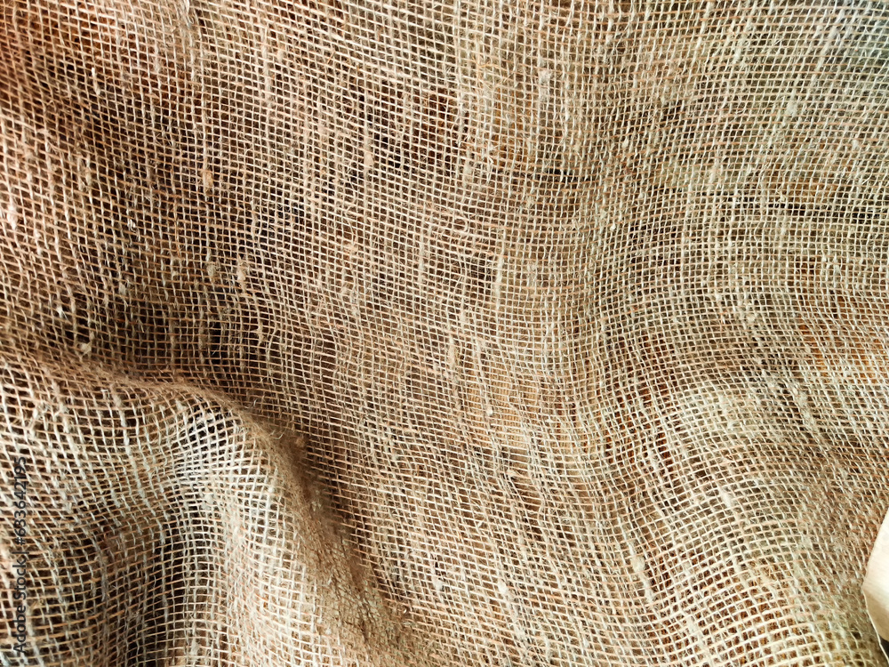 Fototapeta premium Background and texture of jute fabric. Abstract pattern, frame, space for text, copy space