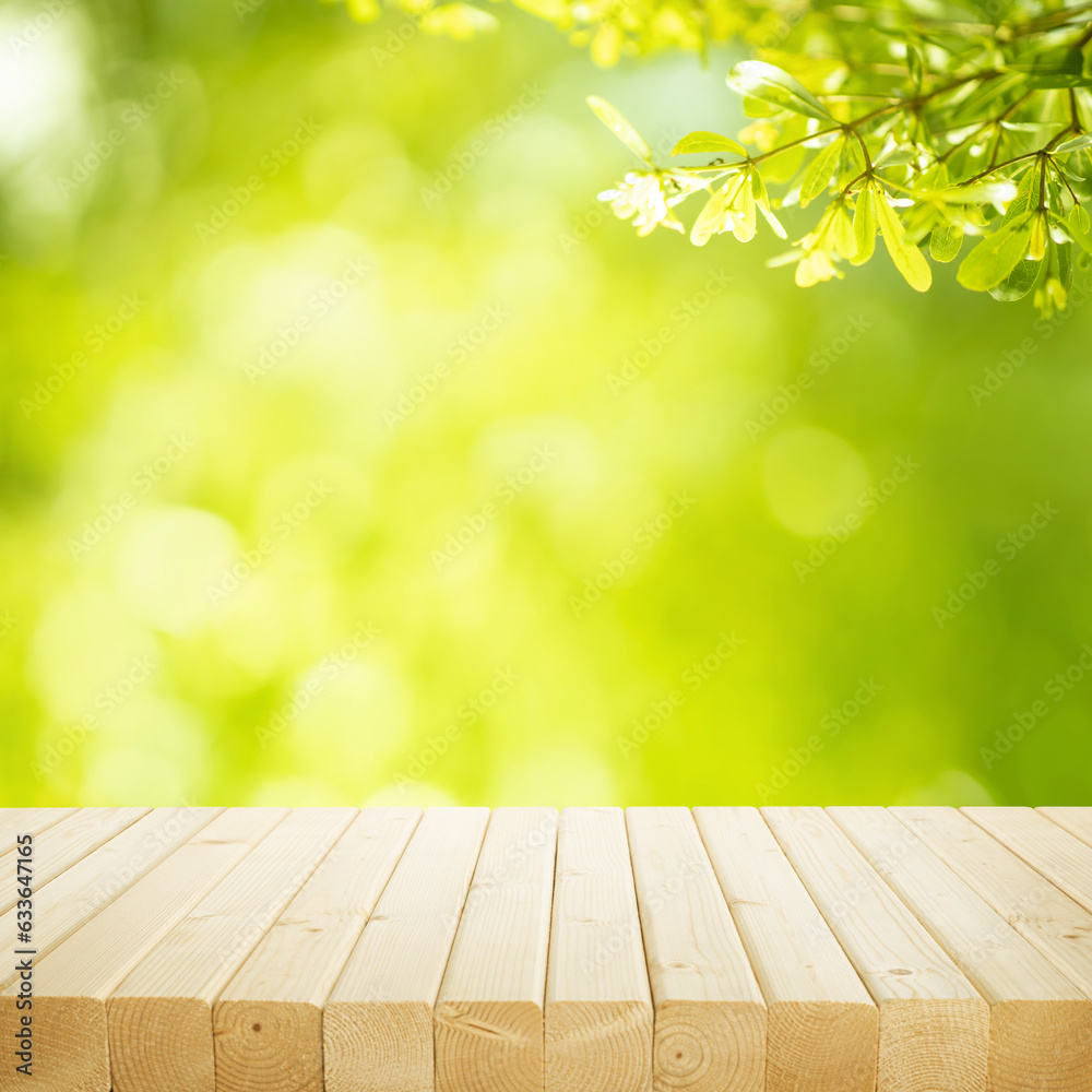 selective focus.real wood table top texture on blur leaf tree garden background.For selective focus.real wood table top texture on blur leaf tree garden background.For