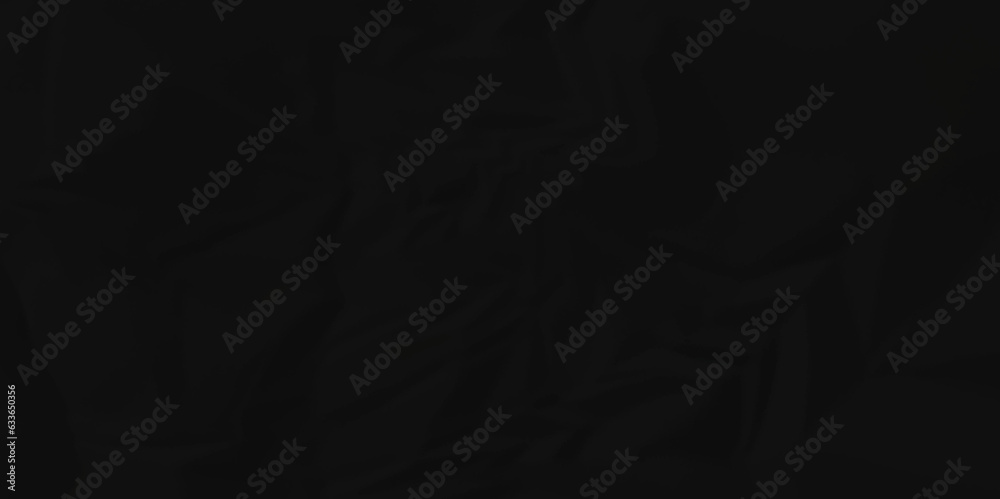 Dark crumple black paper wrinkled poster template ,blank glued creased paper texture background. black paper crumled backdrop background. used for cardboard and clarkboard.