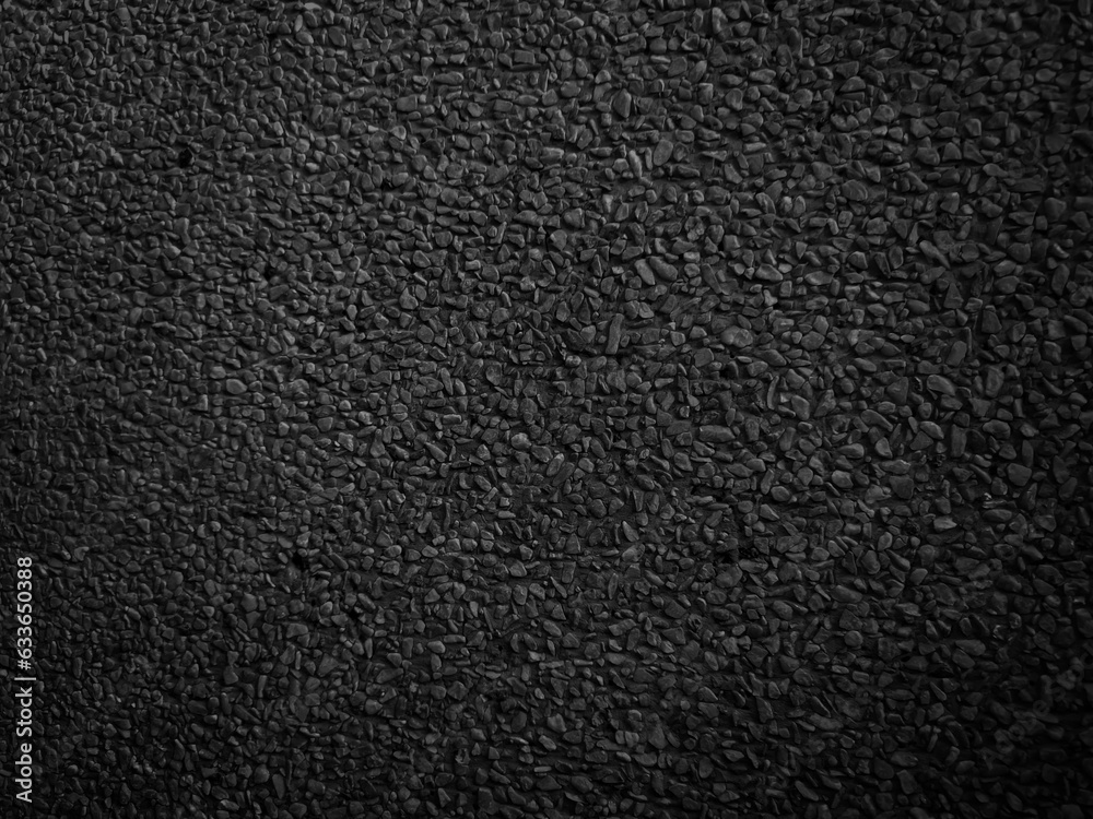 Black asphalt floor or road texture background. Black small stone floor texture background