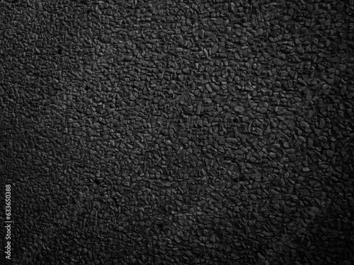 Black asphalt floor or road texture background. Black small stone floor texture background