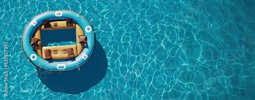 Top view of blue swimming pool and relaxing aqua activities. Enjoying summer vibes with inflatable fun with ring float