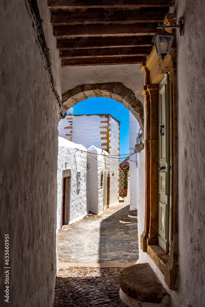Naklejka premium Streets of Chora and iconic Monastery of Saint John the Theologian in chora of Patmos island, Dodecanese, Greece