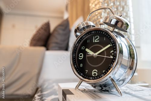 close up view of alarm-clock in morning bedroom environment