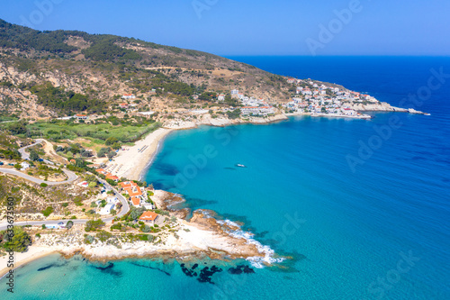 LAerial drone photo of famous wavy beach of Mesakti ideal for wind surfing in island of Ikaria, Aegean, Greece