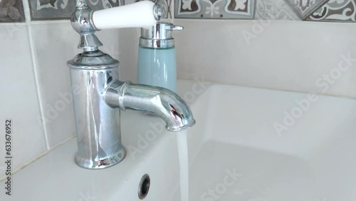 Water tap in the bathroom, hygiene concept