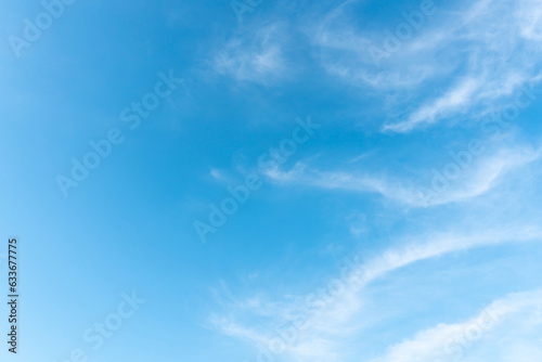 Beautiful blue sky with strange shape of clouds in the morning or evening taken at the sea for natural background or texture