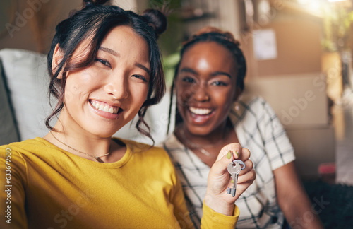 Photos Couple of friends, keys and new home selfie for moving in together for real estate investment