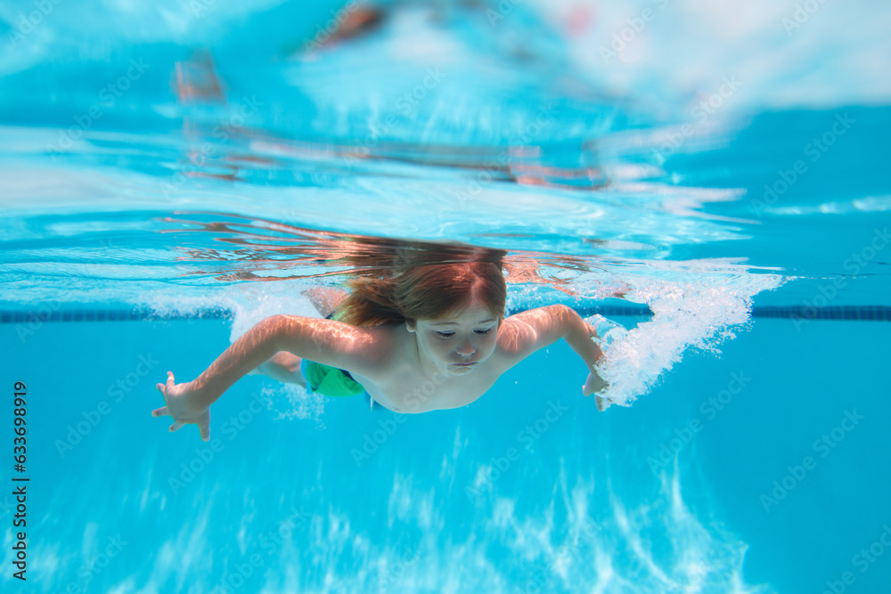 Summer vacation with children. Underwater child swims in pool, healthy child swimming and having fun under water. Beach sea and water fun.
