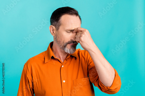 Photo of fail trouble businessman depressed pensioner touch nose stress mood dissatisfied tension unwell isolated on cyan color background