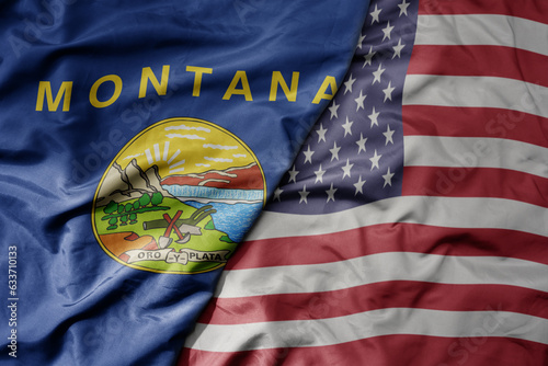 big waving colorful national flag of united states of america and flag of montana state .