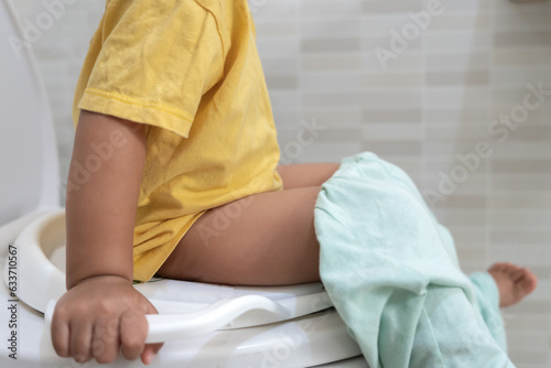 Obraz na plátne child going to the toilet, constipation in children, dyspepsia, abdominal pain,
