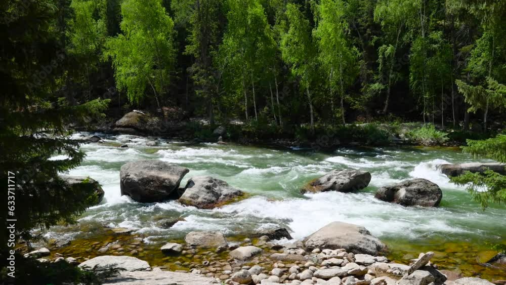 The river in the canyon flows down from the heights The river in the canyon flows down from the heights