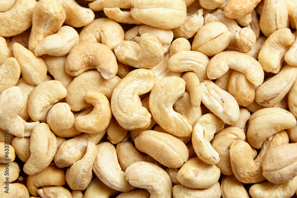 Cashew nut heap food texture background. cashew kernels, a delight, top view Cashew nut heap food texture background. cashew kernels, a delight, top view