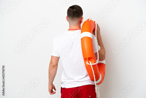 Young brazilian man isolated on white background with lifeguard equipment in back position