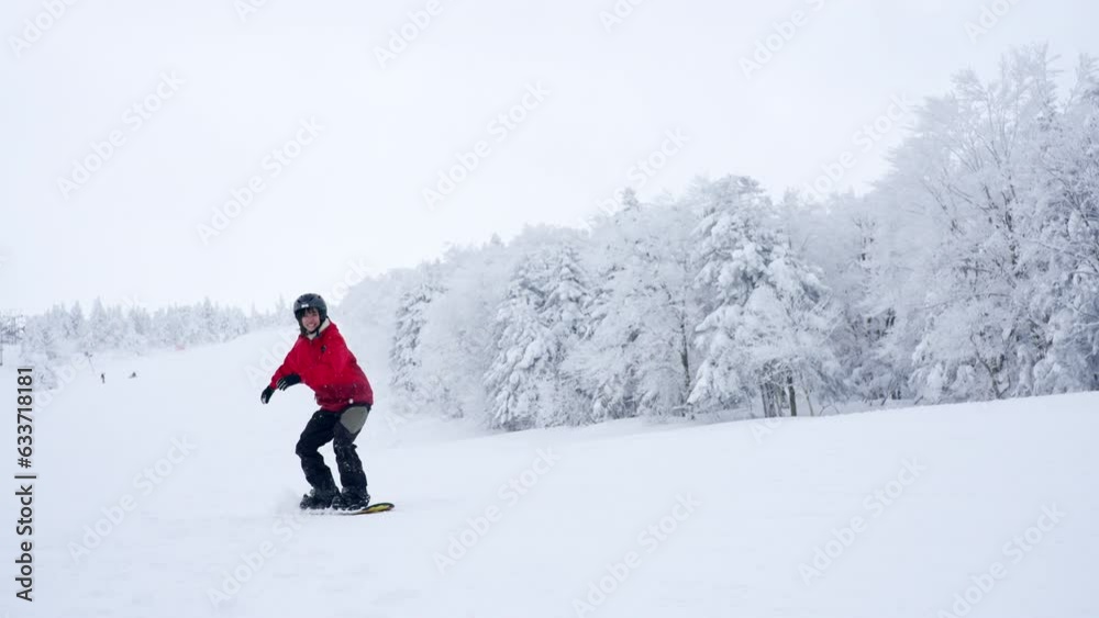 Young Asian woman practice downhill sliding snowboard on snow mountain at ski resort. Attractive girl enjoy outdoor active lifestyle travel nature and winter extreme sport training on holiday vacation Young Asian woman practice downhill sliding snowboard on snow mountain at ski resort. Attractive girl enjoy outdoor active lifestyle travel nature and winter extreme sport training on holiday vacation